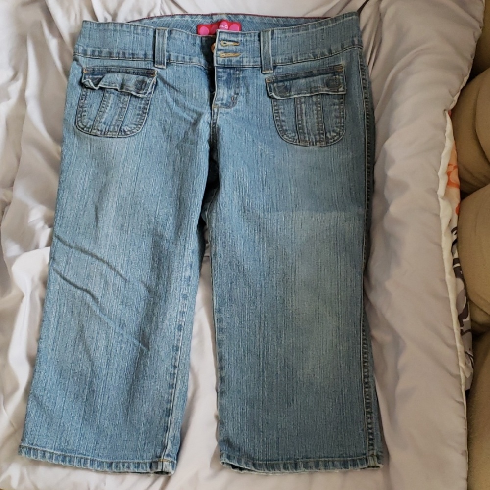 Light blue faded denim capris